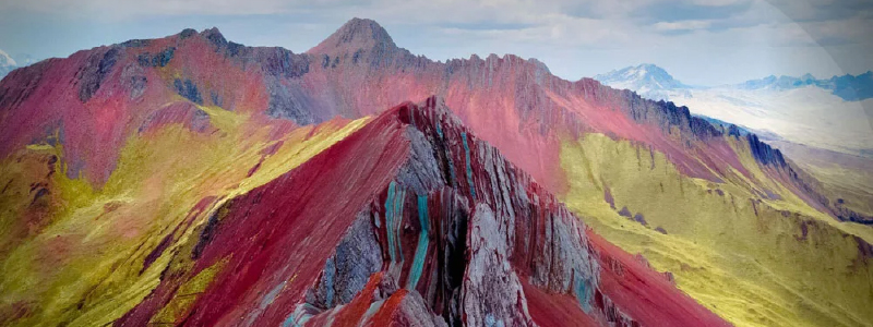 Hiker at Pallay Punchu colorful mountain in Cusco region